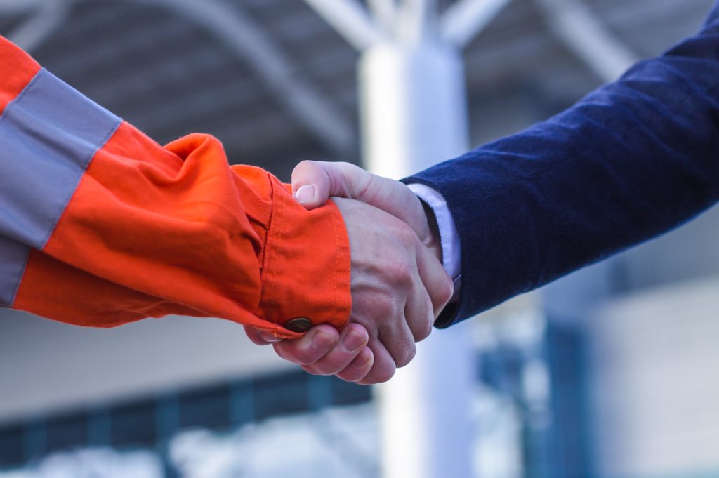 businessman handshaking with worker handshake of 2021 09 03 20 18 13 utc