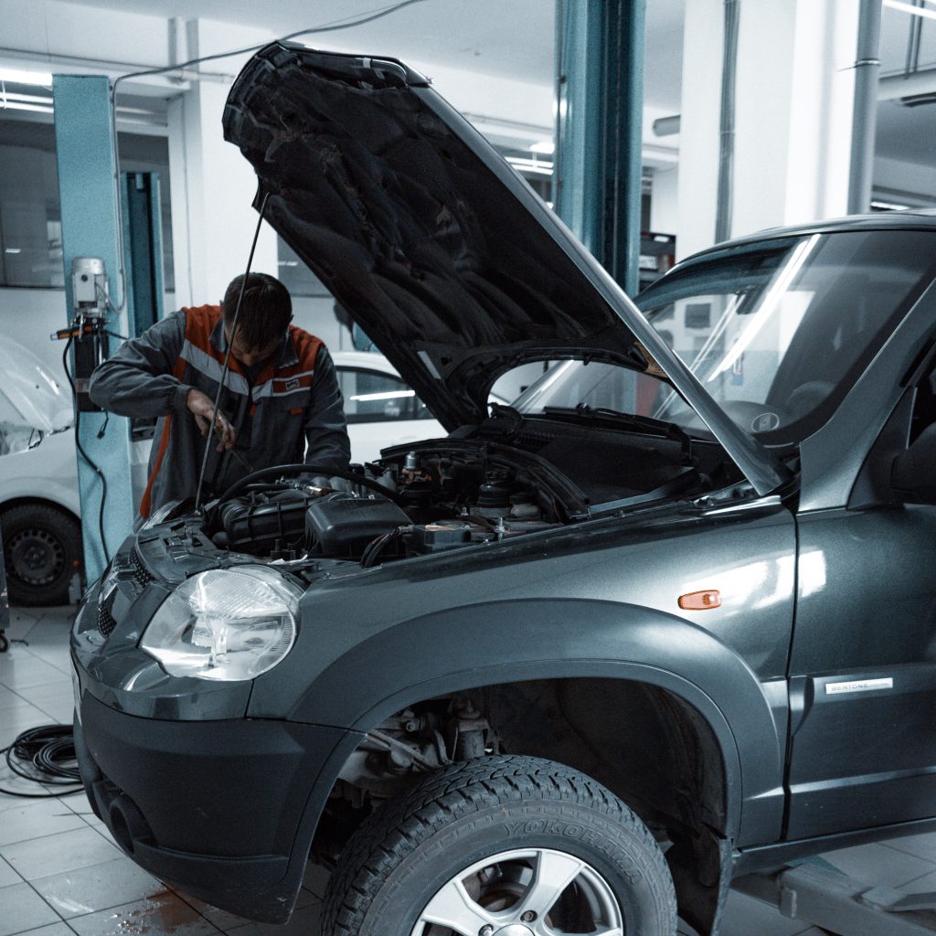 car mechanic working on a car